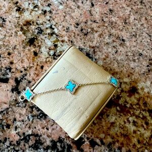 Sterling silver bracelet with diamonds and real turquoise.